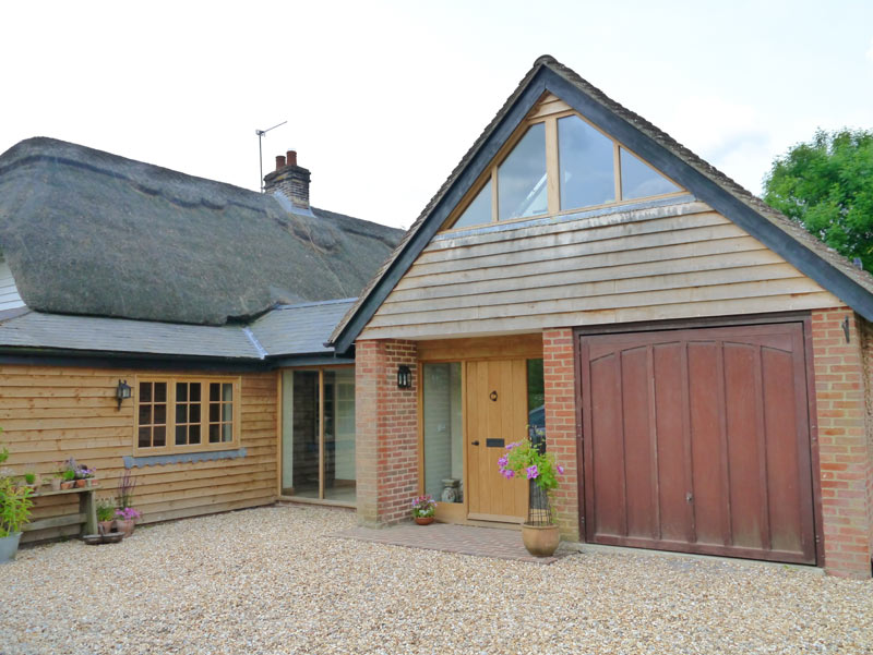 Large extension to a thatched cottage